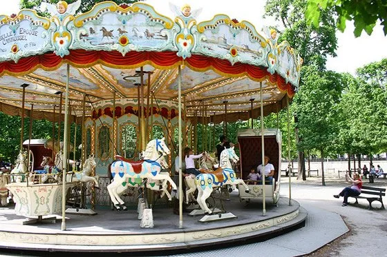 Carousel in Paris with children having fun